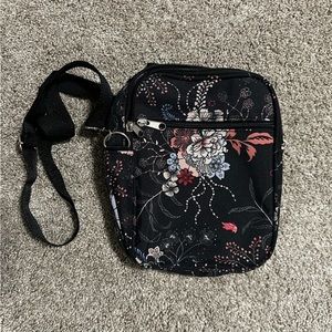Black Crossbody Bag with Floral Print. Multiple compartments.